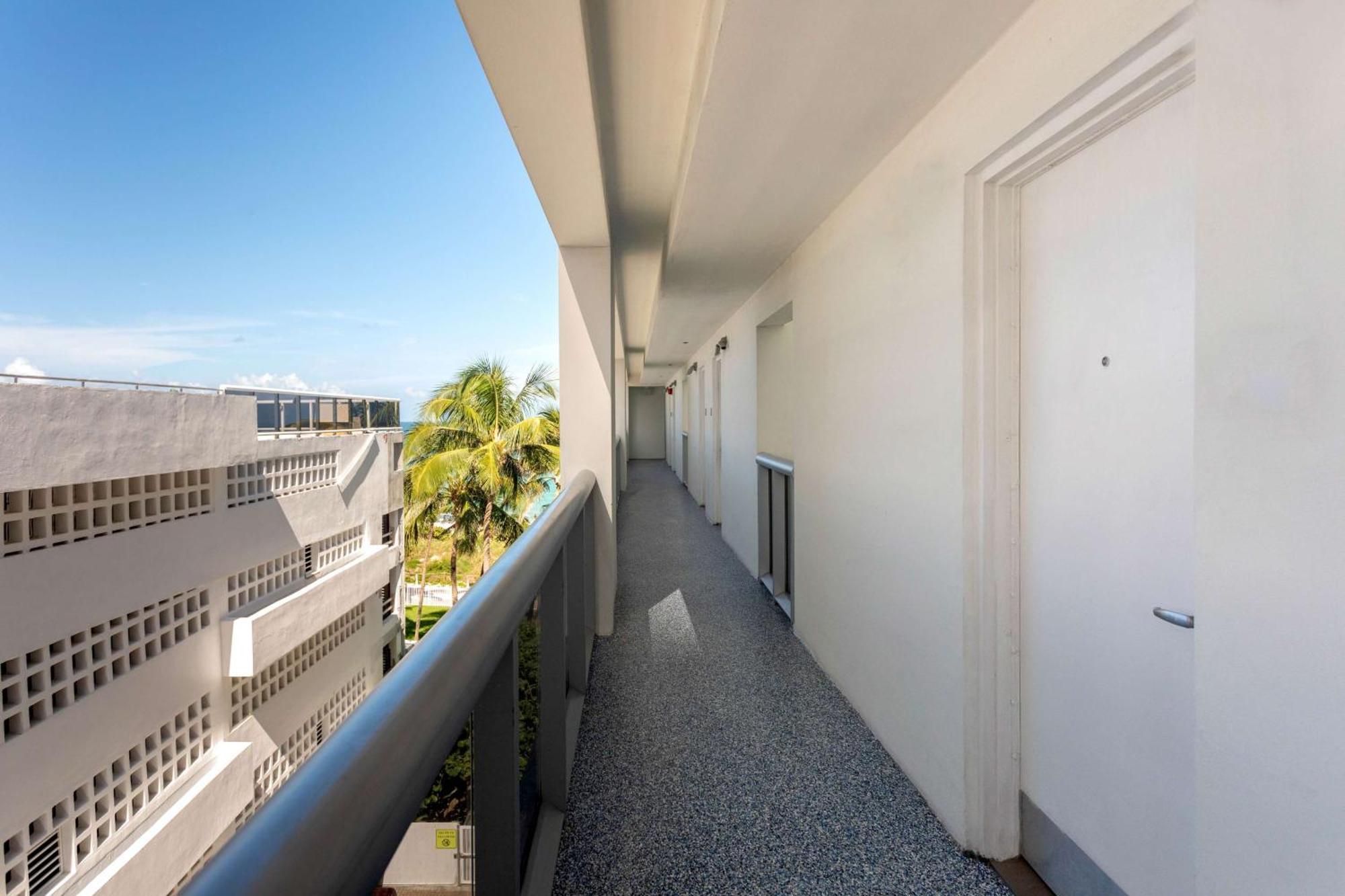 2 Queen Beds Partial Oceanview Balcony Exterior Wing,1622046301:JPEG